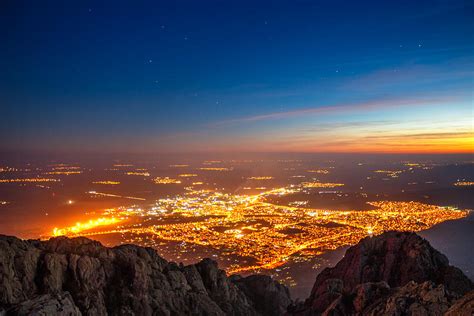 Beautiful sunset over the city, scenic panoramic view Photograph by Valentin Valkov - Pixels