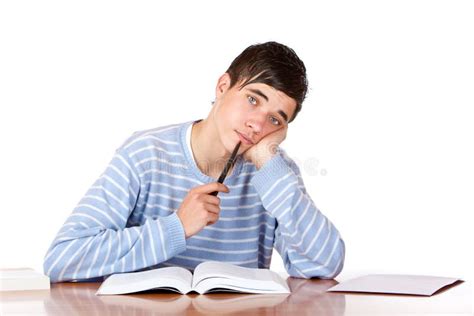 Young Sad Male Student Learns with Study Books Stock Photo - Image of ...