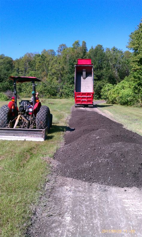 Just not Fill Dirt Anymore: Crushed Asphalt creates a great driveway...