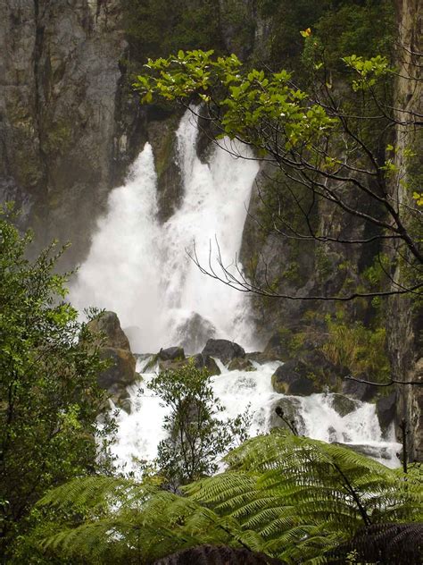 Tarawera Falls - Emerging from Tall Cliffs by Lake Tarawera