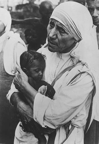 Mother Teresa Helping The Poor