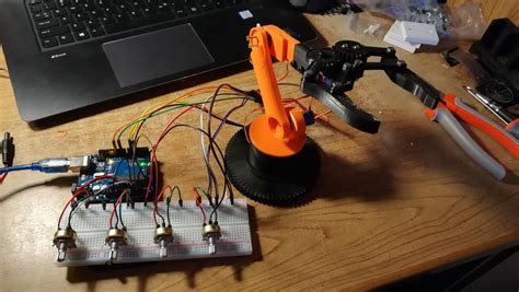 Finished my first "big" 3D-printing/Arduino project, a working robotic arm controlled with mini ...