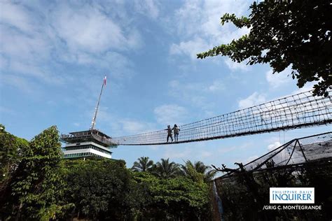 LOOK: Locals climb the hanging bridge of the 360 degree view deck at Cloud Nine in Antipolo City ...