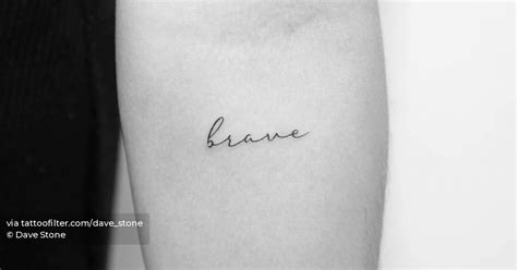 Tattoo of the word "brave" handwritten on the inner