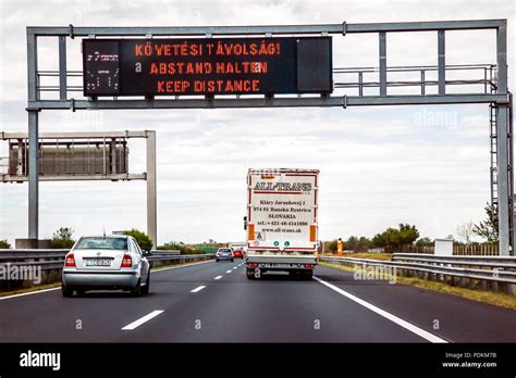 Road signs on overhead gantry hi-res stock photography and images - Alamy