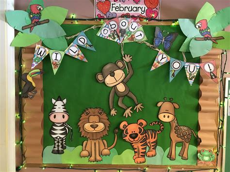 a bulletin board decorated with animals and trees