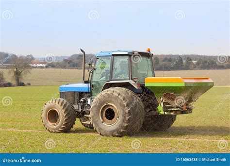 Spreading fertilizer stock photo. Image of nature, plants - 16563438