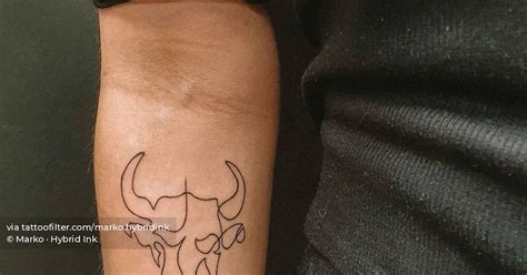 One line bull tattoo located on the inner forearm.