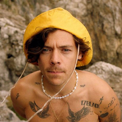 Harry Styles Explores Italy's Amalfi Coast — in Five Different Outfits — in 'Golden' Music Video