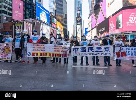 Pro Chinese democracy activists hold banners during the China Democracy Party demonstration at ...