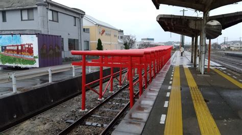 The Japanese train station with torii gates on its tracks - Japan Today