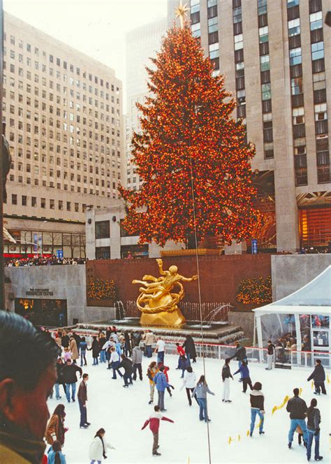 Ice Skating Rink Prometheus Statue And Christmas Tree Photograph by James Connor - Fine Art America