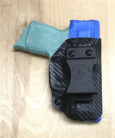 IWB holster for Kahr CM9 in black carbon fiber. Durable .080” Kydex, adjustable retention and ...