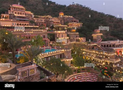 Dramatic Neemrana Fort Palace at Night with lights at Rajasthan India ...