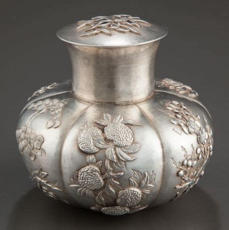 Silver Holloware, Chinese Export:Holloware, A CHINESE EXPORT SILVER TEA CADDY . Luen Wo ...