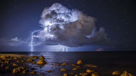 Wallpaper Storm, lightning, sea, stones 3840x2160 UHD 4K Picture, Image