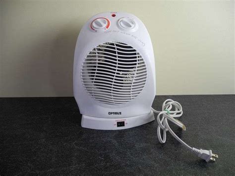 Small Optimus Oscillating Electric Heater - GC5 Auctions