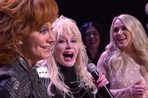 Remember When Dolly Parton Surprised Reba McEntire on the Opry?