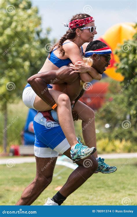 Man Carries Woman Piggyback Style at Atlanta Field Day Games Editorial Stock Image - Image of ...