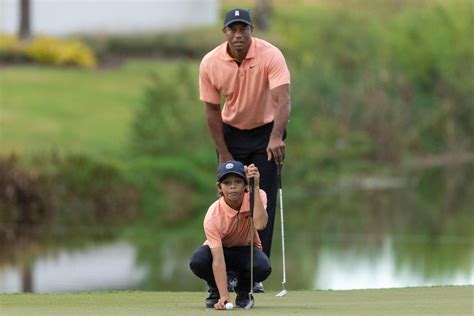 Tiger Woods makes happy return to golf alongside son at PNC Championship; duo fires 62 - The ...