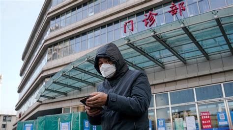 China Covid: Hospitals under strain in wave of infections - BBC News