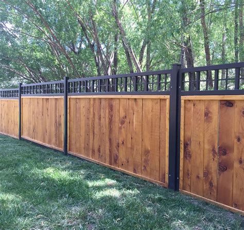 Steel frame fence panels with wood privacy fence is a unique and beautiful fence! | Privacy ...