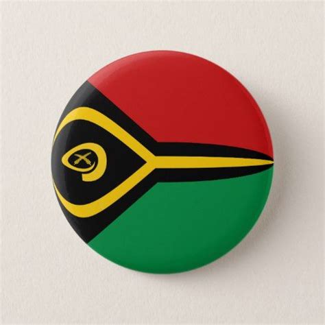 a button with the flag of south africa in red, green and yellow on it