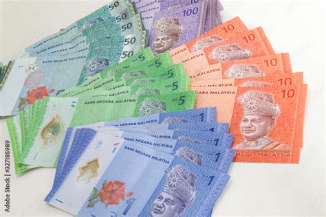 Malaysia Currency (MYR): Stack of Ringgit Malaysia bank note. There is a Malaysia banknotes in ...