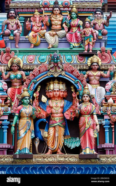 Hindu temple and shrine of Batu Caves. Colorful statues of various ...