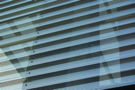 Perforated corrugated metal panel | Perforated metal, Perforated metal panel, Metal cladding