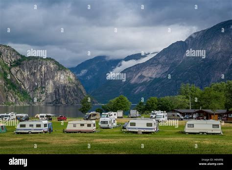 Camping at north sea fjord with mountains background, Norway Stock ...