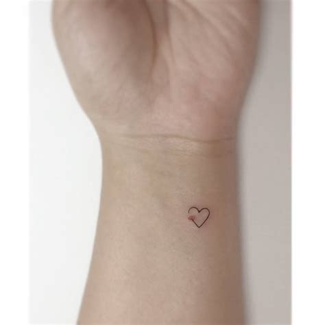 Tiny Heart Tattoo On Wrist