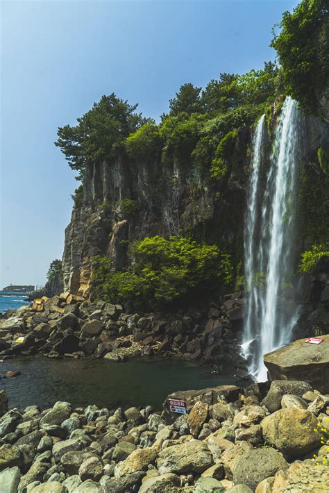 Jeongbang Waterfall - Jeju, South Korea | Explore Stronger