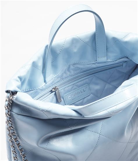 Chanel 22 backpack, Calfskin & silver metal, light blue — Fashion | CHANEL