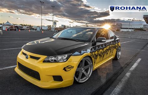 Yellow Scion TC with Custom Graphics and Lambo Doors — CARiD.com Gallery