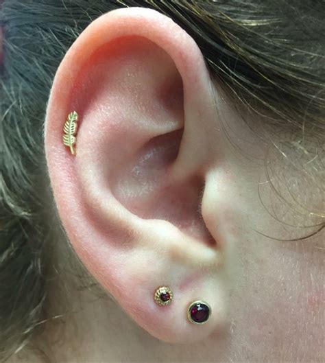 Ear Lobe Piercing [50 Ideas]: Pain Level, Healing Time, Cost ...