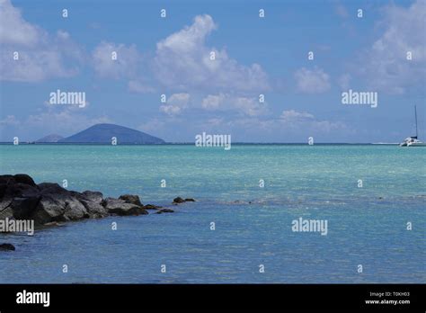 Round Island, Mauritius from the coast at Calodyne Stock Photo - Alamy