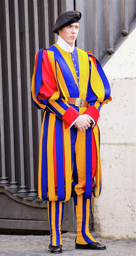 Vatican city. Swiss guard in traditional uniform Photograph by Marco Mariani - Pixels