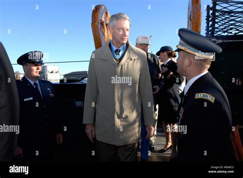 Retired U.S. Army Lt. Gen. Robert Foley, a Medal of Honor recipient, boards the frigate USS ...