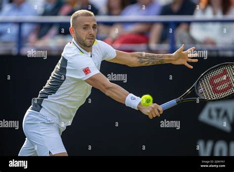 Eastbourne, England, 21 June, 2022. Tennis player, Daniel Evans playing single handed forehand ...