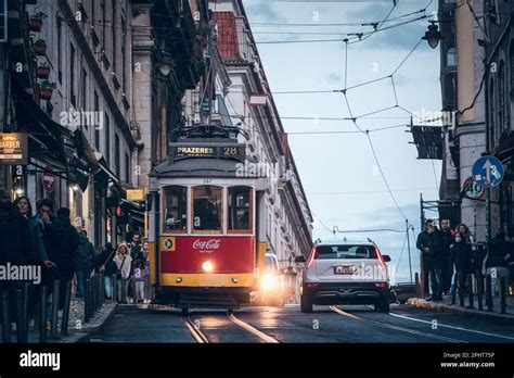 Old tram through the streets of beautiful Lisbon Stock Photo - Alamy