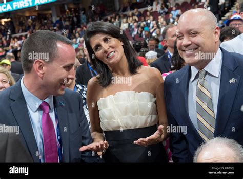 South Carolina Gov. Nikki Haley, center, with her husband Michael Haley, right, and SC GOP ...