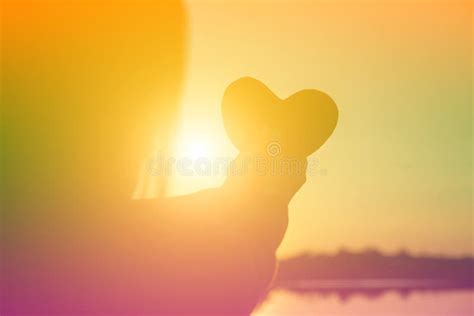 Hands Forming a Heart Shape with Sunset Silhouette Stock Image - Image of nature, background ...