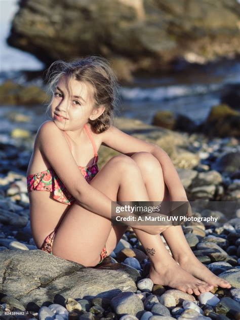 Young Girl At The Beach High-Res Stock Photo - Getty Images