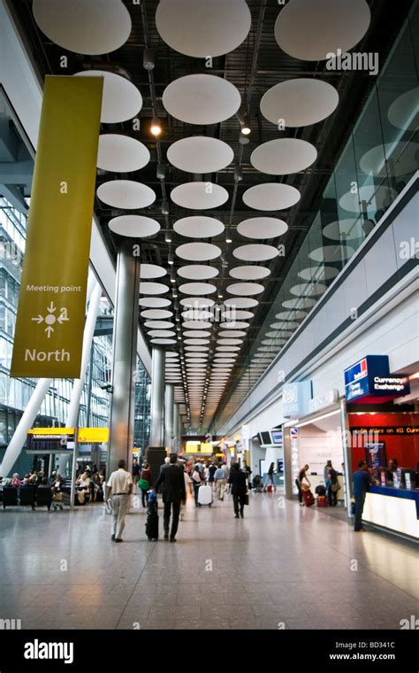 Arrivals at Heathrow Airport Terminal 5 Stock Photo - Alamy