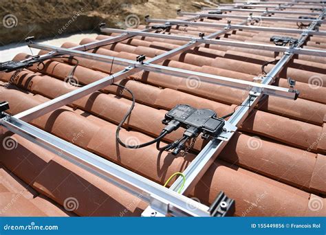 Mounting Rails and Electrical Cables before Installation of Solar Panels on Roof Stock Photo ...