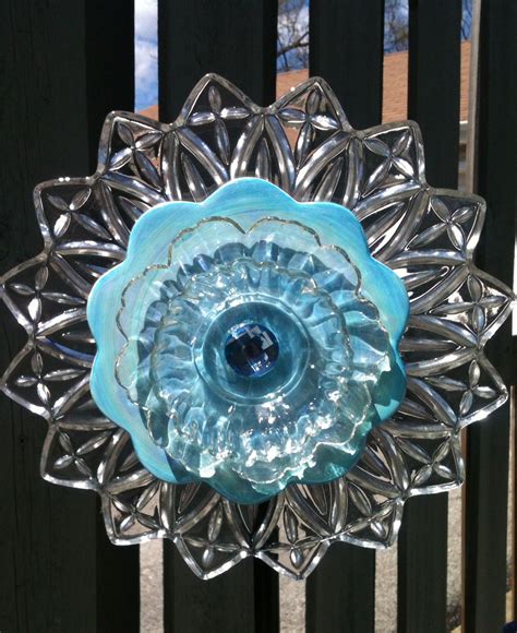 Recycled glass flower | Recycled garden art, Flower plates, Recycled glass