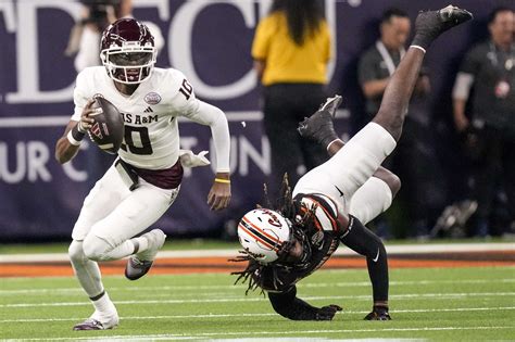 Texas Bowl: Oklahoma State holds off undermanned Texas A&M