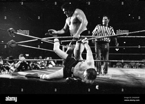 Professional Wrestler Andre the Giant tosses heavyweight contender ...