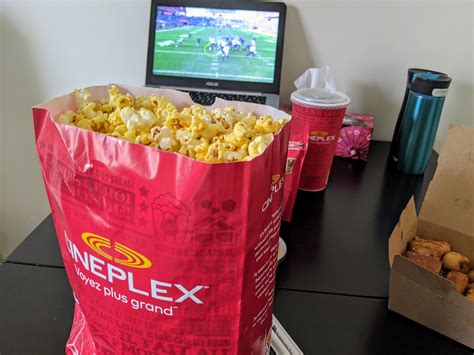 Smooch Food: Popcorn from Cineplex while enjoying NFL Wild Card Round